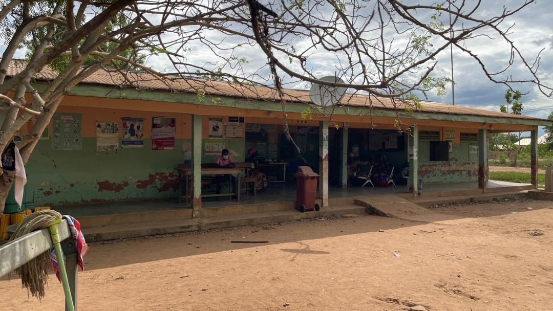 Patients waiting at Bonakye Health Centre — mothers and children seeking care